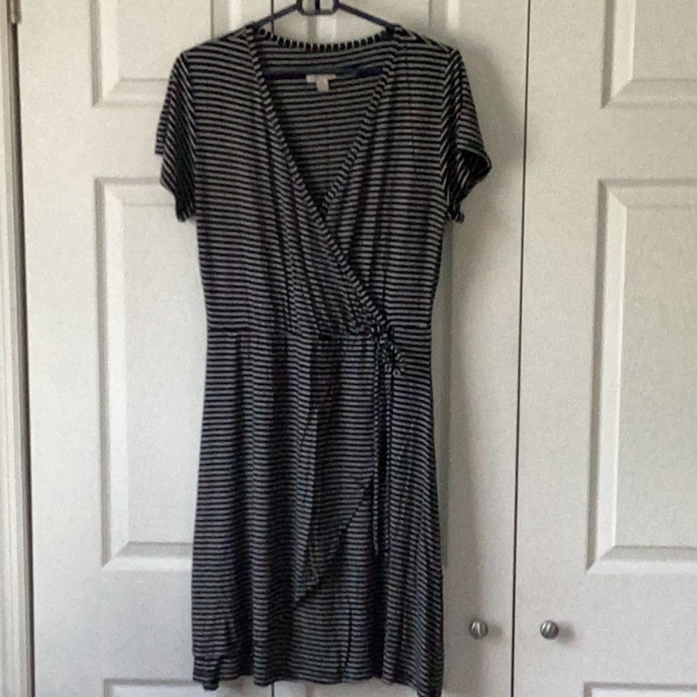 Women’s striped, wrap-style dress.